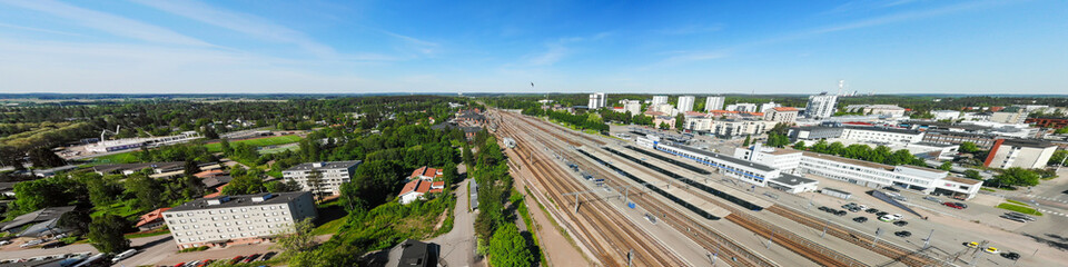 Fototapeta na wymiar Aerial panoramic view of Kouvola railway station and city center.