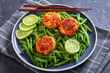Prawn and Crab Cakes on a plate with green beans