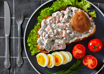 danish smorrebrod with shrimps, mayo, roe, and egg