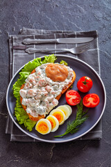 danish smorrebrod with shrimps, mayo, roe, and egg