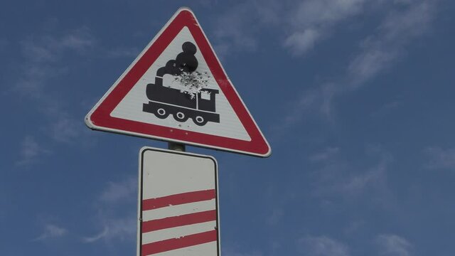 railroad crossing warning sign. triangle sign with train