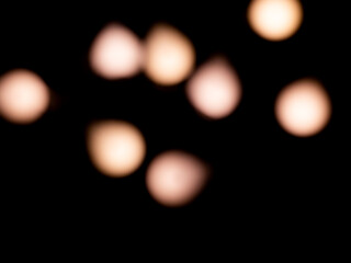 bokeh warm white light on black background overlay