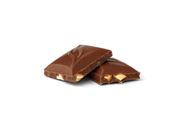 Pieces of chocolate with nuts isolated on white background.