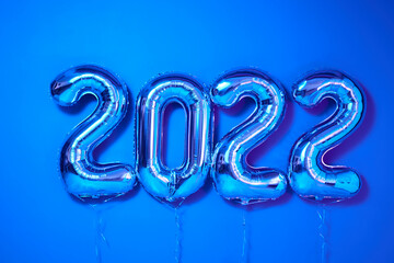 From above number balloons Happy New Year Festive monochrome shot