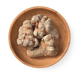 Dried notoginseng in the wooden bowl,  isolated on white background, top view