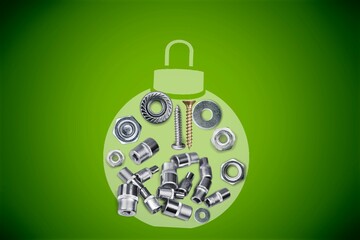 Different bolts, nuts, nails, screws, tools in a Christmas ball