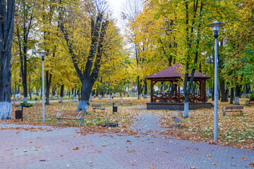 Fototapeta na wymiar A pavilion in the Roman Park in the autumn, Romania 