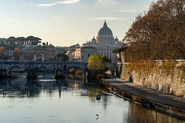 Rome, Italy. Vatican dome of Saint Peter Basilica (Italian: San Pietro) and Sant'Angelo Bridge,...