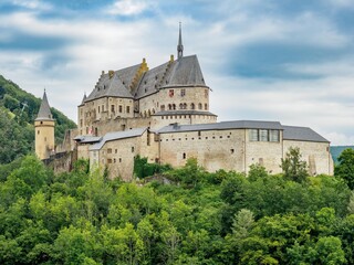 Fototapeta premium Vianden castle between forest, Luxembourg