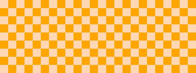 Checkerboard banner. Orange and Apricot colors of checkerboard. Small squares, small cells. Chessboard, checkerboard texture. Squares pattern. Background.