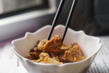 Traditional Korean pork belly kimchi stew with rice - jjigae