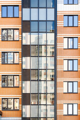 glazed balconies and loggias of modern apartment buildings