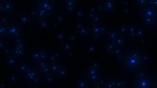 Blue neon lights move randomly on a black background. Dance of the blue fireflies.