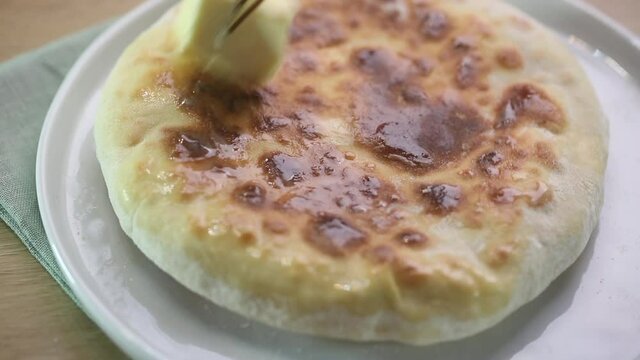 Preparing Khachapuri, cheese bread, traditional caucasian food
