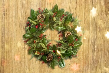 Beautiful Christmas wreath on the stone desk