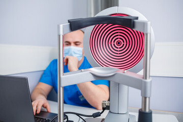 Microscopic apparatus for testing eyesight. Ophthalmology and treatment of eye diseases. Eye...