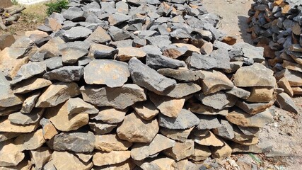 Background photo of a pile of flat stones in the Cikancung area, Indonesia