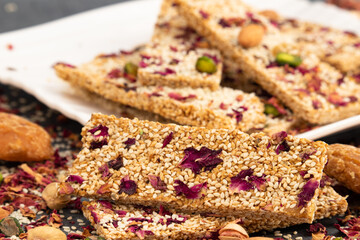 Winter Delicacy Makar Sankranti Or Lohri Mithai Gulab Gajak Also Known As Gur Gajjak, Gazak, Gachak Til Patti Or Papdi, Chikki Is Made Of Rose, Sesame Seeds, Jaggery Gud, Almonds Badam And Pistachio