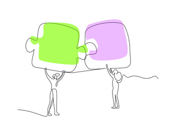 people putting together puzzle pieces work together