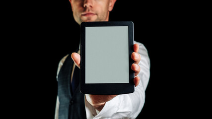 E reader. Digital e book, library reader tablet in business man hand. Online education course, E learning class and ebook digital technology concept.