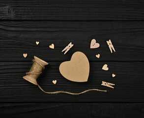 Preparing Valentine gifts on black wooden table