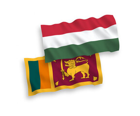 National vector fabric wave flags of Sri Lanka and Hungary isolated on white background. 1 to 2 proportion.