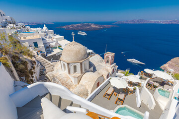 Luxury summer relaxation background. Summer vacation at Santorini, swimming pools, hot tubs looking out over the Caldera sea view of Santorini, Greece. Panoramic cityscape, travel landscape