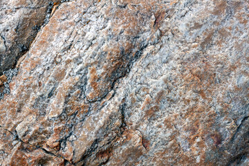 Background of a mountain stone covered with moss.