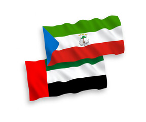 National vector fabric wave flags of Republic of Equatorial Guinea and United Arab Emirates isolated on white background. 1 to 2 proportion.