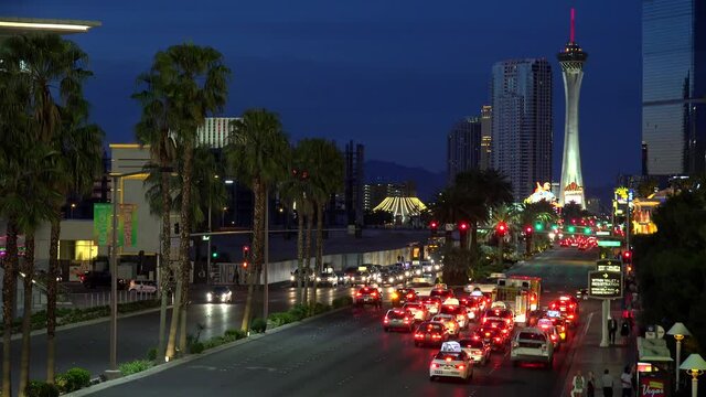 Road Traffic at Las Vegas Strip at night (From the Fashion Show Mall Bridge to North).Timelapse. Nevada, USA