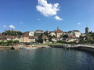 Fototapeta na wymiar Summer townscape on a lake in Switzerland