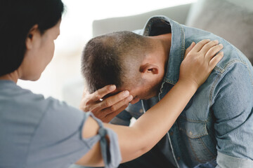 Female Psychologist, friend or family sitting and put hands on the shoulder for cheer up to mental...