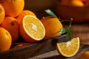 Fresh oranges on the wooden table