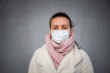 A picture of a girl in a mask. isolated Covid-19 pandemic.