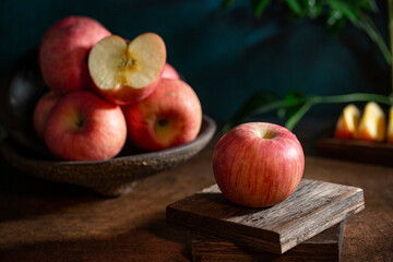 Fresh apples on the  wooden table