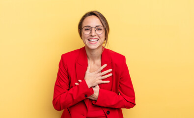 businesswoman laughing out loud at some hilarious joke