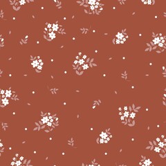 Vintage pattern. small white flowers, leaves and dots. brown background. Seamless vector template for design and fashion prints.