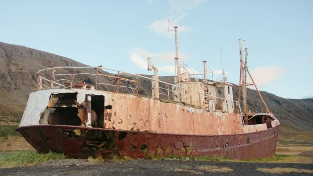 View from behind on the stranded ship, a tourist attraction the wreck of an old ship Gardar BA 64