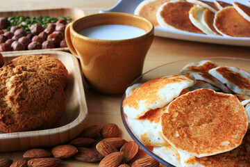 Pancakes, cookies and milk for breakfast