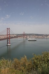 25th of April Suspension Bridge over the Tejo river in Lisbon, Portugal