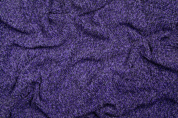 Plakat Violet color of the year texture knitted fabric. Blue knitted Jersey as textile background.