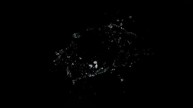 Super slow motion of water vortex on black background. Filmed on high speed cinema camera, 1000 fps.