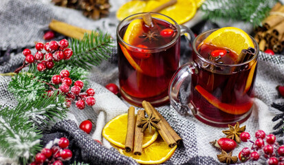 hot mulled wine on a wooden table. New year concept