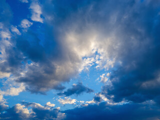 Naklejka na ściany i meble Blue sky and fluffy clouds