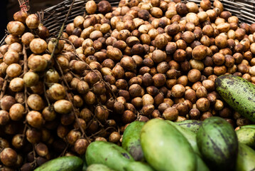 Green mangoes and longans