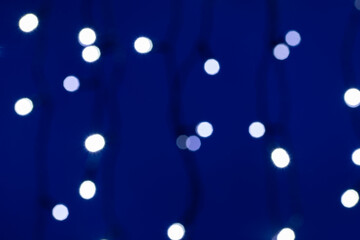 abstract Christmas lights background on blue