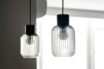 Glass ceiling lamps in white interior. Design