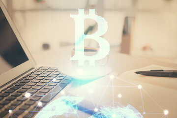 Double exposure of crypto technology drawing and desktop with coffee and items on table background....