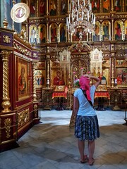 Orthodox churh interior with prayers