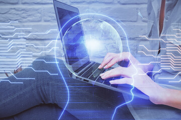 Multi exposure of woman hands working on computer and brain hologram drawing. Ai concept.